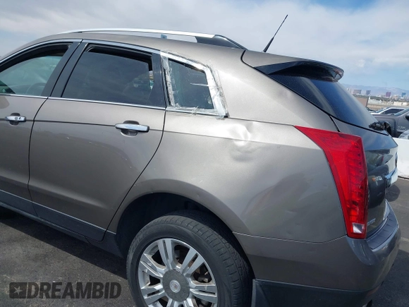 2012 Cadillac SRX Luxury Collection with VIN 3GYFNAE30CS612453, listed as a IAAI auction lot 42048235 with 173,982 mi miles and . Bid and sale history available at carsss.com. Image 13.