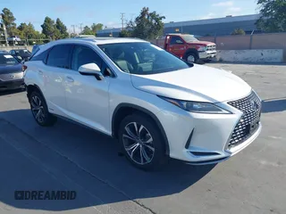 2021 Lexus RX 450h with VIN 2T2HGMDA2MC071281, listed as a IAAI auction lot 42587770 with 88,009 mi miles and . Bid and sale history available at DreamBid. Image 1.