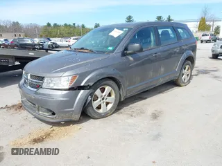 2013 Dodge Journey SE Plus with VIN 3C4PDCAB9DT582144, listed as a IAAI auction lot 41964828 with 171,398 mi miles and . Bid and sale history available at DreamBid. Image 2.