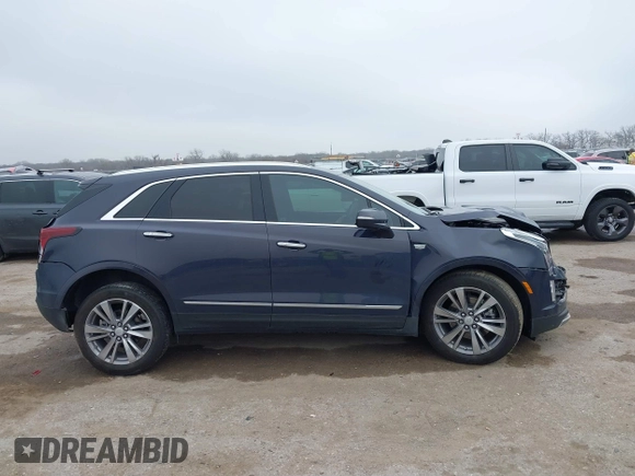 2024 Cadillac XT5 FWD Premium Luxury with VIN 1GYKNCR47RZ755652, listed as a IAAI auction lot 41512069 with 10,243 mi miles. Bid and sale history available at carsss.com. Image 13.