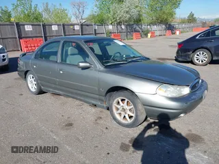 1999 Ford Contour SE Fleet z VIN 1FAFP66L7XK115659, wystawiony jako IAAI lot #42142065 z przebiegiem 161 018 mil mil oraz . Historia ofert i sprzedaży dostępna na DreamBid. Obrazek 1.