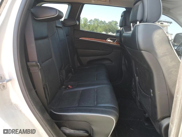 2012 Jeep Grand Cherokee Overland with VIN 1C4RJFCG5CC272580, listed as a Copart auction lot 50075735 with 209,368 mi miles and Salvage Title. Bid and sale history available at carsss.com. Image 11.