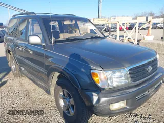 2002 Toyota Land Cruiser with VIN JTEHT05J122022183, listed as a IAAI auction lot 41440395 with 288,686 mi miles. Bid and sale history available at carsss.com. Image 1.