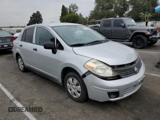 2009 Nissan Versa 1.6 with VIN 3N1CC11E79L429613, listed as a Copart auction lot 72220034 with 134,891 mi miles and Salvage Title. Bid and sale history available at carsss.com. Image 4.