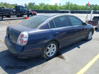 2006 Nissan Altima 2.5 S with VIN 1N4AL11D66C168564, listed as a IAAI auction lot 42038146 with 122,658 mi miles. Bid and sale history available at carsss.com. Image 4.