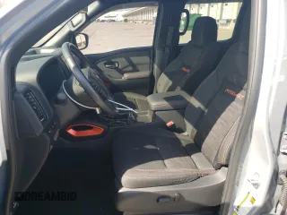 2022 Nissan Frontier Pro-4X with VIN 1N6ED1EK3NN676511, listed as a Copart auction lot 52030375 with 34,753 mi miles and Salvage title. Bid and sale history available at DreamBid. Image 7.
