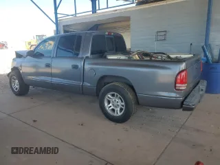 2001 Dodge Dakota Sport z VIN 1B7HL2AN21S298590, wystawiony jako Copart lot #54430385 z przebiegiem 175 365 mil mil oraz Szkoda całkowita • Salvage title. Historia ofert i sprzedaży dostępna na DreamBid. Obrazek 2.