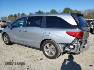 2020 Honda Odyssey EX-L with VIN 5FNRL6H73LB056720, listed as a Copart auction lot 87205024 with 60,219 mi miles and Salvage Title. Bid and sale history available at carsss.com. Image 2.