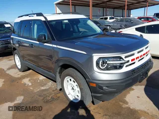 2024 Ford Bronco Sport Heritage z VIN 3FMCR9G64RRE03926, wystawiony jako IAAI lot #41641234 z przebiegiem 7 372 mil mil oraz . Historia ofert i sprzedaży dostępna na DreamBid. Obrazek 1.