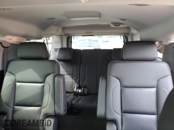 2015 Chevrolet Suburban LTZ with VIN 1GNSKKKC1FR624679, listed as a Copart auction lot 52957365 with 71,194 mi miles and Salvage Title. Bid and sale history available at DreamBid. Image 10.