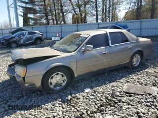 2002 Cadillac DeVille DHS z VIN 1G6KE57Y52U115257, wystawiony jako Copart lot #49781735 z przebiegiem 125 210 mil mil oraz Szkody całkowita. Historia ofert i sprzedaży dostępna na DreamBid. Obrazek 1.