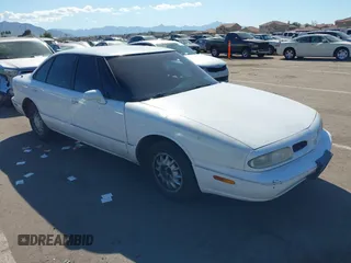 1999 Oldsmobile 88 LS z VIN 1G3HN52K4X4803686, wystawiony jako IAAI lot #39567309 z przebiegiem 169 203 mil mil oraz . Historia ofert i sprzedaży dostępna na DreamBid. Obrazek 1.