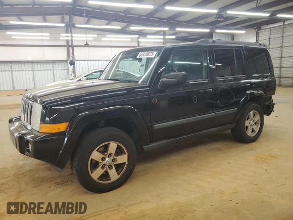 2008 Jeep Commander Sport z VIN 1J8HG48K08C135414, wystawiony jako Copart lot #52410675 z przebiegiem 200 480 mil mil oraz Szkoda całkowita • Salvage title. Historia ofert i sprzedaży dostępna na DreamBid. Obrazek 1.