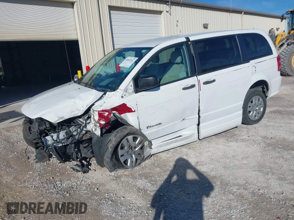 2019 Dodge Grand Caravan SE with VIN 2C7WDGBG7KR803126, listed as a IAAI auction lot 40835937 with 63,100 mi miles and . Bid and sale history available at DreamBid. Image 18.