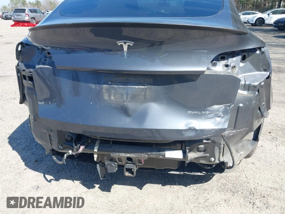 2021 Tesla Model Y Long Range with VIN 5YJYGDEE4MF119249, listed as a IAAI auction lot 41764711 with 87,796 mi miles. Bid and sale history available at carsss.com. Image 6.