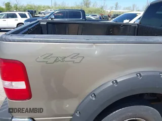 2005 Ford F-150 XLT with VIN 1FTPX14535FB40621, listed as a IAAI auction lot 42130458 with 122,764 mi miles. Bid and sale history available at carsss.com. Image 12.