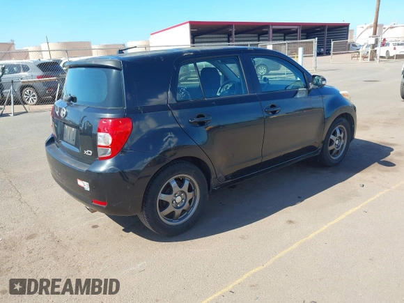 2008 Scion xD with VIN JTKKU10498J006447, listed as a IAAI auction lot 41883311 with 116,444 mi miles. Bid and sale history available at carsss.com. Image 4.