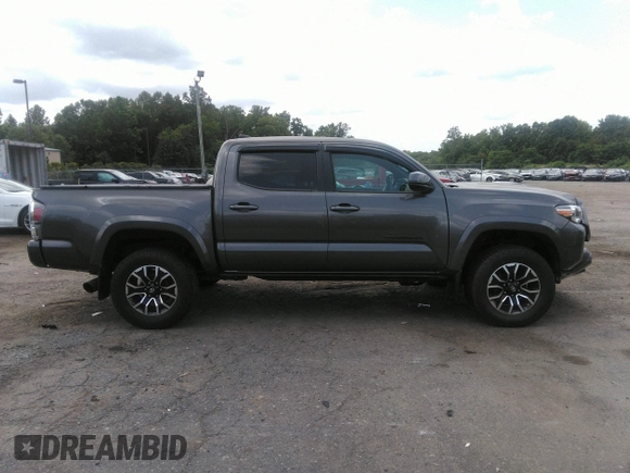 2021 Toyota Tacoma SR z VIN 3TYCZ5AN7MT017377, wystawiony jako IAAI lot #42285326 z przebiegiem 91 657 mil mil oraz . Historia ofert i sprzedaży dostępna na DreamBid. Obrazek 13.
