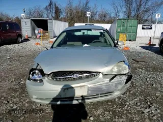 2003 Ford Taurus SE Standard with VIN 1FAFP53U53G225534, listed as a Copart auction lot 50206975 with 216,667 mi miles and Salvage Title. Bid and sale history available at DreamBid. Image 11.