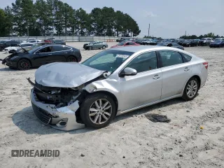 2013 Toyota Avalon XLE with VIN 4T1BK1EB5DU032083, listed as a Copart auction lot 59183535 with 201,415 mi miles and Salvage title. Bid and sale history available at DreamBid. Image 1.