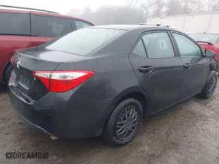 2016 Toyota Corolla L with VIN 2T1BURHE6GC563636, listed as a IAAI auction lot 41574487 with 148,154 mi miles. Bid and sale history available at carsss.com. Image 4.