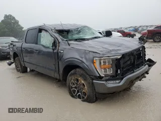 2023 Ford F-150 XL with VIN 1FTFW1E86PFA65505, listed as a Copart auction lot 60644385 with 6,959 mi miles and Salvage title. Bid and sale history available at DreamBid. Image 4.