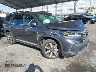 2025 Honda Pilot Touring with VIN 5FNYG2H73SB004351, listed as a IAAI auction lot 41699830 with 6,377 mi miles. Bid and sale history available at carsss.com. Image 1.