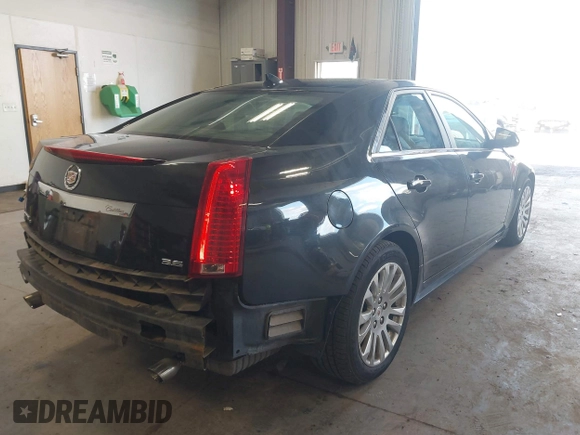 2011 Cadillac CTS Performance with VIN 1G6DL5ED6B0131490, listed as a IAAI auction lot 41980231 with 75,040 mi miles and . Bid and sale history available at DreamBid. Image 4.