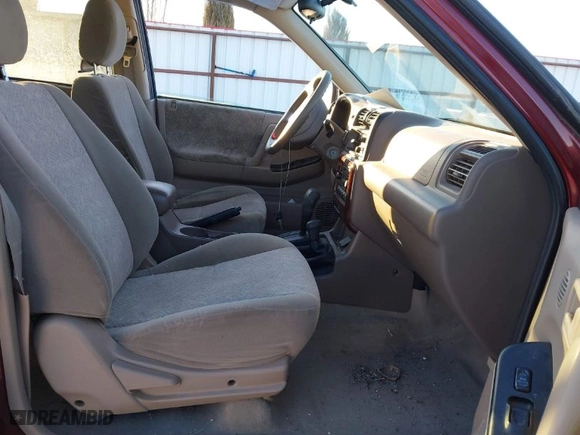 2002 Isuzu Rodeo with VIN 4S2DM58W124319936, listed as a IAAI auction lot 41555285 with 143,035 mi miles. Bid and sale history available at carsss.com. Image 5.