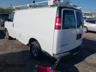 2004 Chevrolet Express Cargo Van with VIN 1GCFG15X141203951, listed as a IAAI auction lot 42046954 with 299,890 mi miles. Bid and sale history available at carsss.com. Image 3.