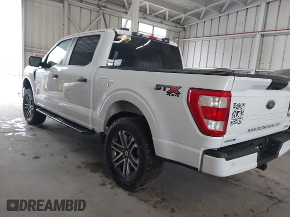 2023 Ford F-150 XL with VIN 1FTEW1EP7PKE20482, listed as a IAAI auction lot 41848669 with 27,933 mi miles. Bid and sale history available at carsss.com. Image 3.