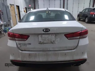 2018 Kia Optima S with VIN 5XXGT4L35JG209737, listed as a IAAI auction lot 41806505 with 98,869 mi miles and . Bid and sale history available at DreamBid. Image 17.