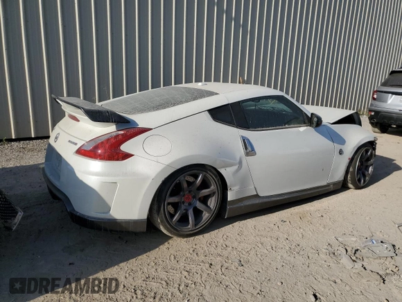 2014 Nissan 370Z Touring with VIN JN1AZ4EH5EM630793, listed as a Copart auction lot 77950484 with 110,229 mi miles and Salvage Title. Bid and sale history available at carsss.com. Image 3.