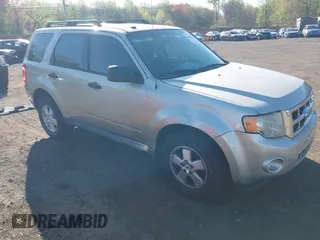 2010 Ford Escape XLT with VIN 1FMCU9D75AKB64794, listed as a IAAI auction lot 42141609 with 118,791 mi miles. Bid and sale history available at carsss.com. Image 1.