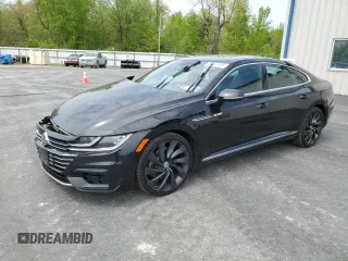 2019 Volkswagen Arteon SEL R-Line с VIN WVWSR7AN5KE025970, выставлен на аукционе Copart как лот 56832655 с пробегом 151 131 миль миль и Списание • Salvage title. История ставок и продаж доступна на DreamBid. Изображение 1.