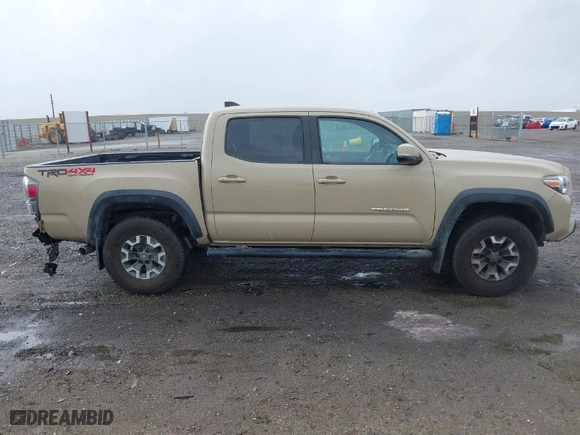 2020 Toyota Tacoma 4WD SR5 with VIN 3TMCZ5AN0LM340440, listed as a IAAI auction lot 41576373 with 98,843 mi miles. Bid and sale history available at carsss.com. Image 13.