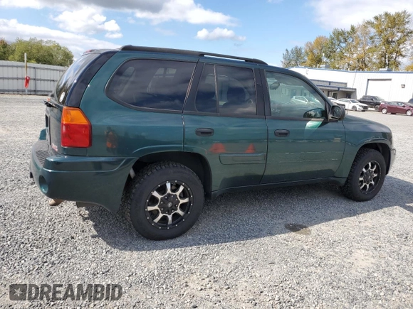 2005 GMC Envoy SLT with VIN 1GKDT13S952144349, listed as a Copart auction lot 71800694 with 137,614 mi miles and Salvage Title. Bid and sale history available at DreamBid. Image 3.