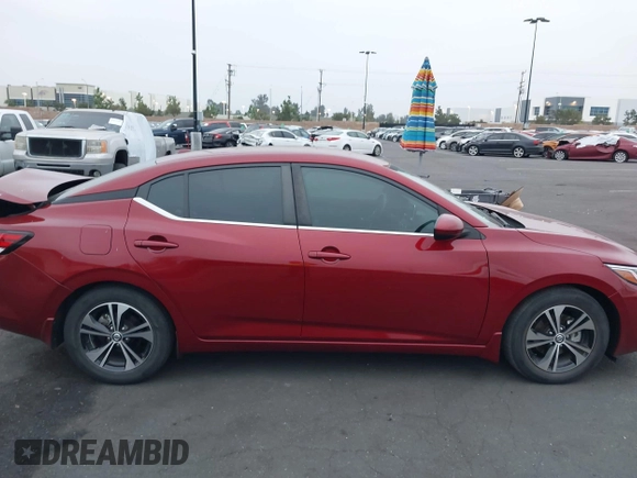 2022 Nissan Sentra SV z VIN 3N1AB8CV7NY268158, wystawiony jako IAAI lot #42355360 z przebiegiem 23 940 mil mil oraz . Historia ofert i sprzedaży dostępna na DreamBid. Obrazek 13.