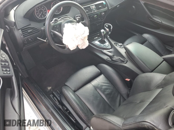 2010 BMW 6 Series 650i z VIN WBAEB5C56AC225685, wystawiony jako Copart lot #86904014 z przebiegiem 36 214 mil mil oraz Szkoda całkowita • Salvage title. Historia ofert i sprzedaży dostępna na DreamBid. Obrazek 8.