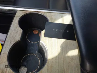 2021 Tesla Model 3 Long Range with VIN 5YJ3E1EB2MF858267, listed as a IAAI auction lot 41782360 with 79,671 mi miles and . Bid and sale history available at DreamBid. Image 11.