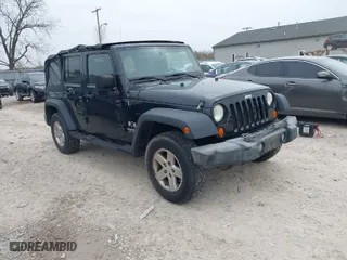 2007 Jeep Wrangler Unlimited X with VIN 1J4GA39177L153387, listed as a IAAI auction lot 42021211 with 207,965 mi miles. Bid and sale history available at carsss.com. Image 1.