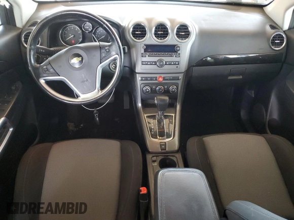 2013 Chevrolet Captiva Sport LS with VIN 3GNAL2EK8DS616908, listed as a Copart auction lot 61965694 with 84,598 mi miles and Salvage Title. Bid and sale history available at DreamBid. Image 8.