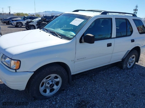2001 Isuzu Rodeo S with VIN 4S2DM58W214347968, listed as a IAAI auction lot 41871597 with 216,343 mi miles. Bid and sale history available at carsss.com. Image 6.
