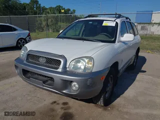 2004 Hyundai Santa Fe GLS with VIN KM8SC73D74U675555, listed as a IAAI auction lot 42021978 with 198,778 mi miles. Bid and sale history available at carsss.com. Image 2.