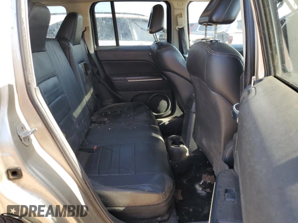 2009 Jeep Patriot Limited with VIN 1J4FT48B99D146489, listed as a Copart auction lot 52484925 with 251,986 mi miles and Salvage title. Bid and sale history available at DreamBid. Image 11.