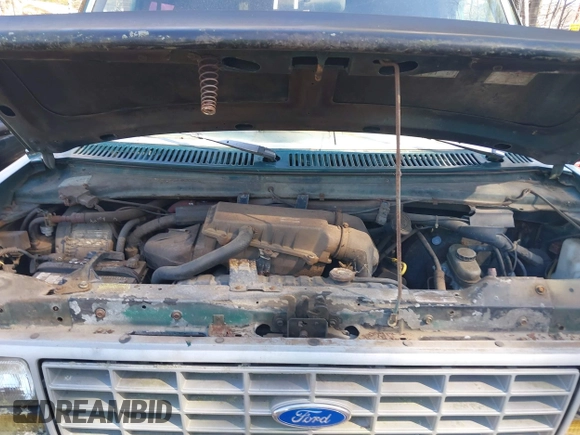 1990 Ford Econoline Cargo with VIN 1FTES14YXLHA99552, listed as a IAAI auction lot 41820558 with 178,000 mi miles and . Bid and sale history available at DreamBid. Image 10.