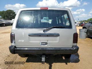 2000 Jeep Cherokee SE with VIN 1J4FT27P6YL127419, listed as a Copart auction lot 74211284 with 199,078 mi miles and Clean title. Bid and sale history available at DreamBid. Image 6.