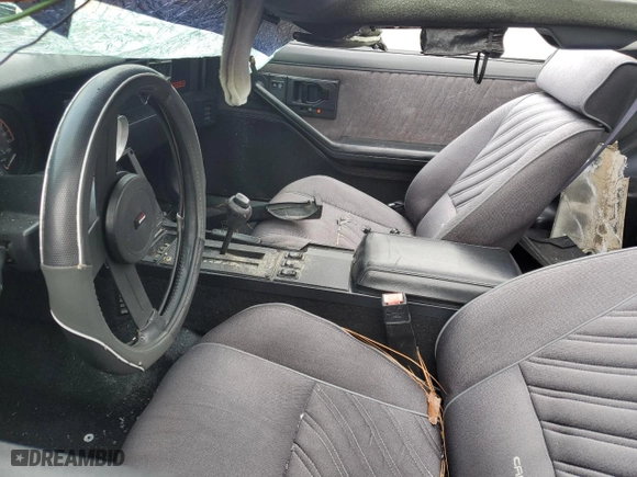 1987 Chevrolet Camaro with VIN 1G1FP21H2HN131699, listed as a Copart auction lot 87860445 with 86,117 mi miles and Salvage Title. Bid and sale history available at carsss.com. Image 7.