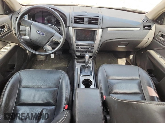 2010 Ford Fusion Hybrid z VIN 3FADP0L39AR152224, wystawiony jako Copart lot #60549615 z przebiegiem 118 939 mil mil oraz Szkoda całkowita • Salvage title. Historia ofert i sprzedaży dostępna na DreamBid. Obrazek 8.
