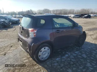 2012 Scion iQ z VIN JTNJJXB00CJ014966, wystawiony jako Copart lot #83100954 z przebiegiem 100 775 mil mil oraz Szkoda całkowita • Salvage title. Historia ofert i sprzedaży dostępna na DreamBid. Obrazek 3.